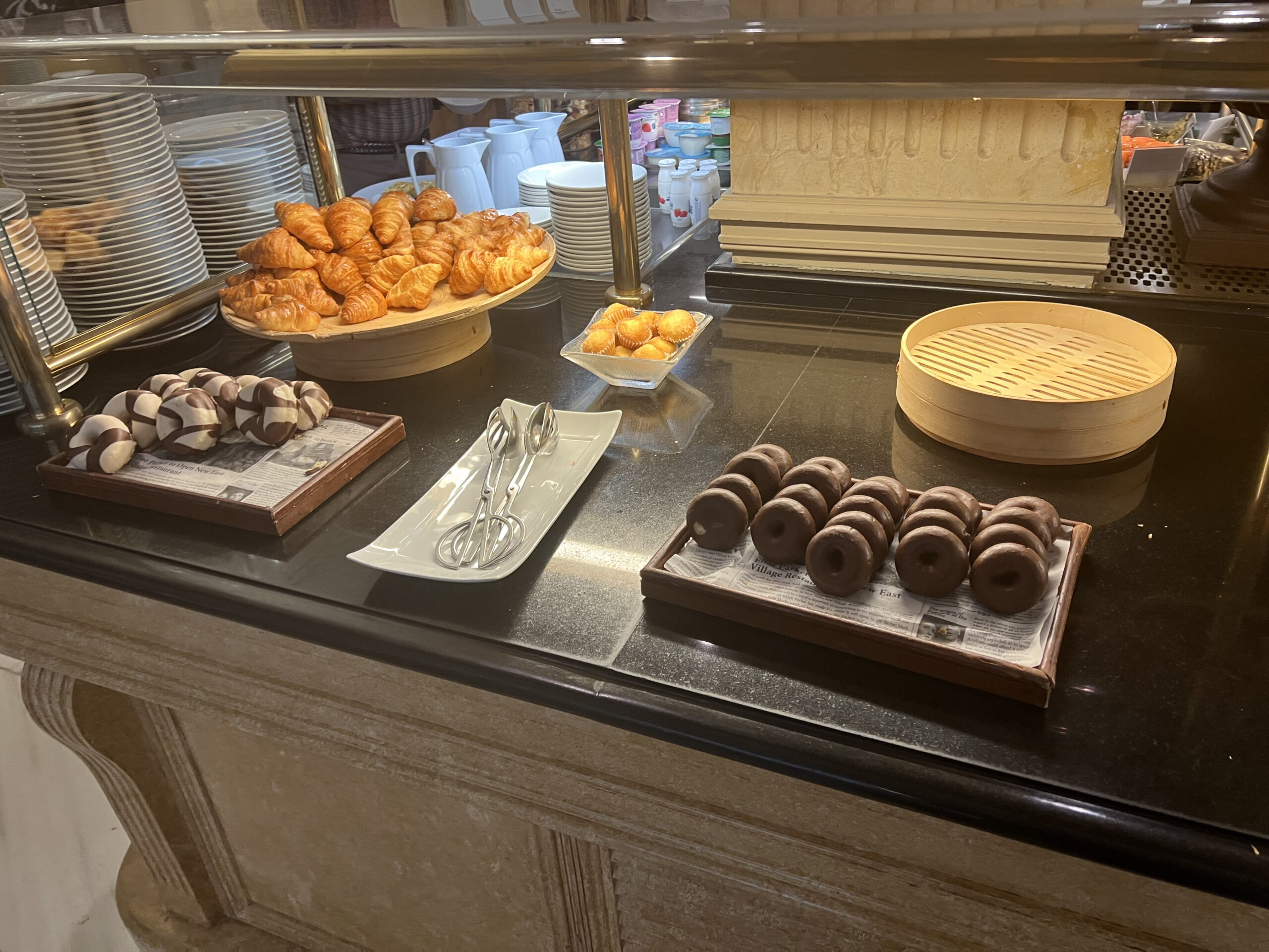 a buffet table with pastries and pastries