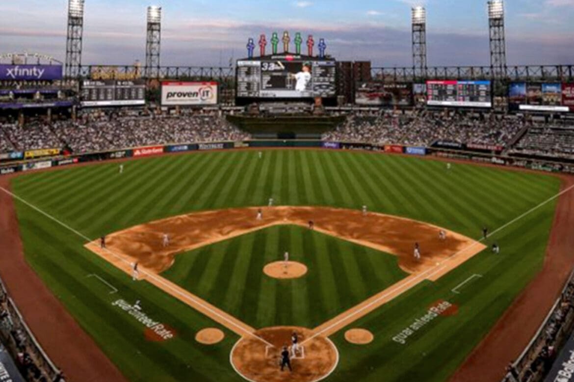 United MileagPlus White Sox a baseball field with people watching with Guaranteed Rate Field in the background