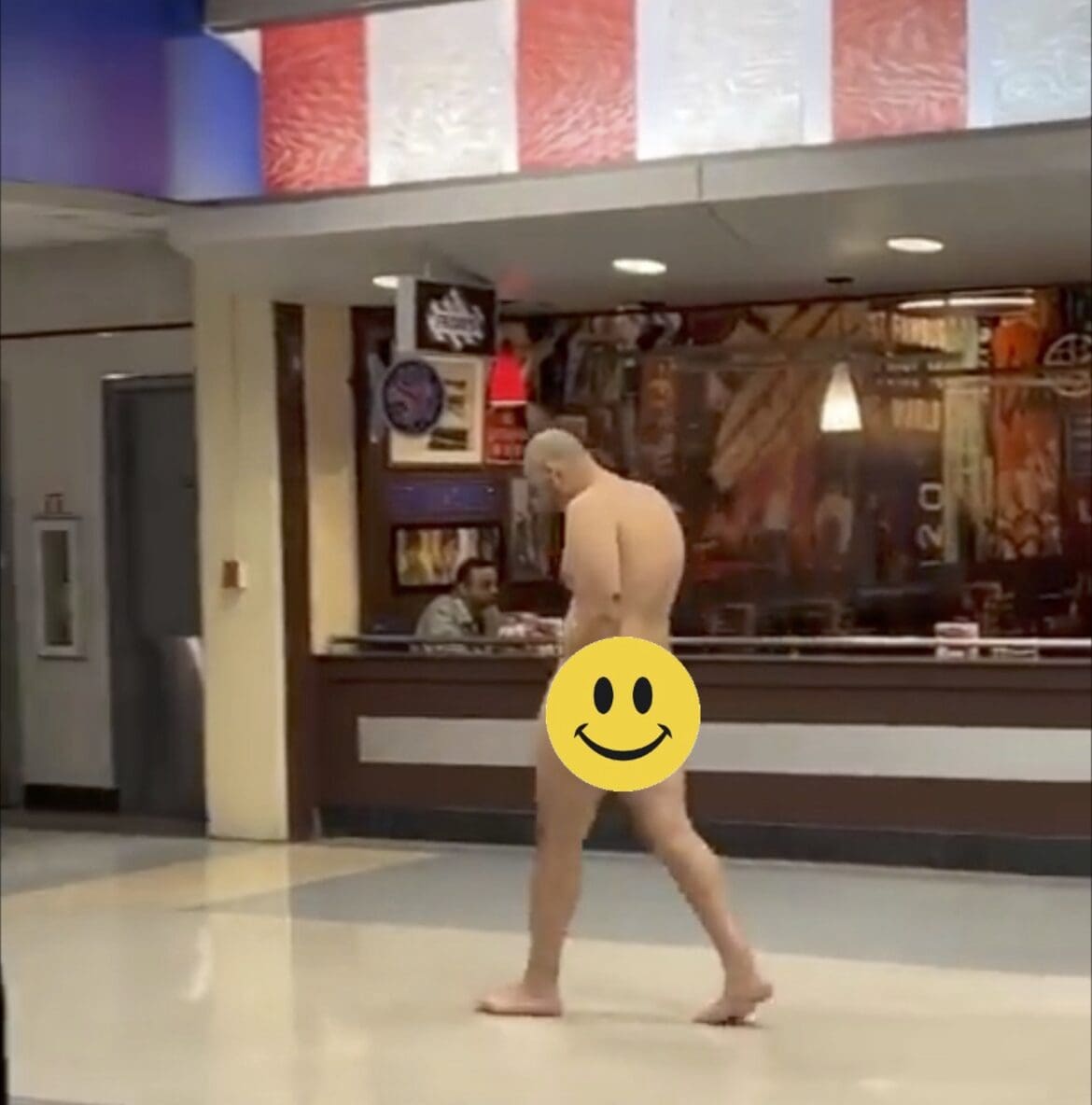 Naked Man DFW a man walking in a store