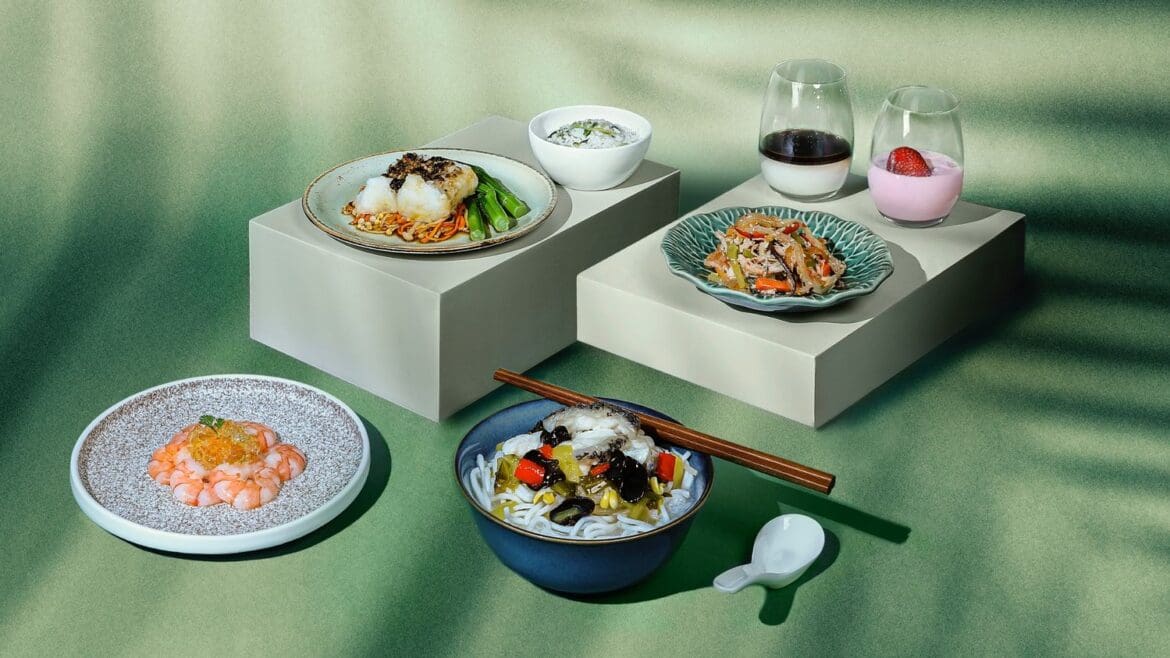 a group of plates of food on a table