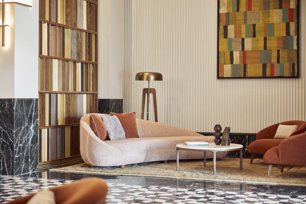 Park Hyatt marrakech 2 a living room with a couch and a table