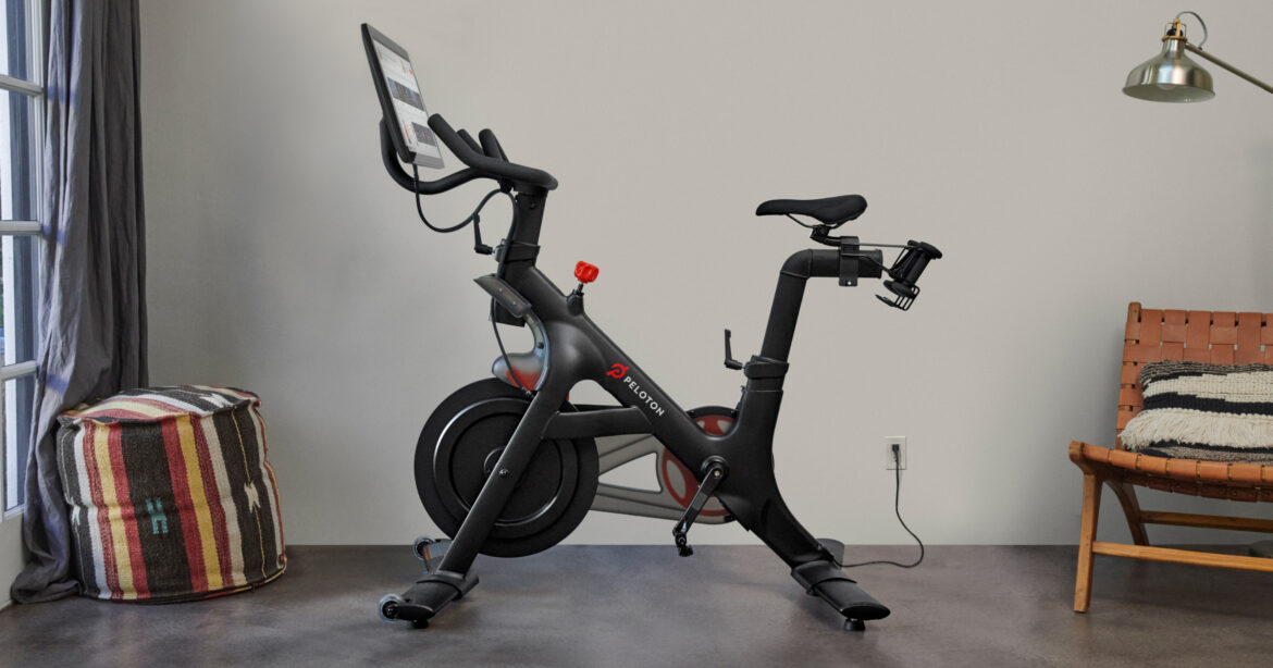 Peloton Bike a black exercise bike with a monitor
