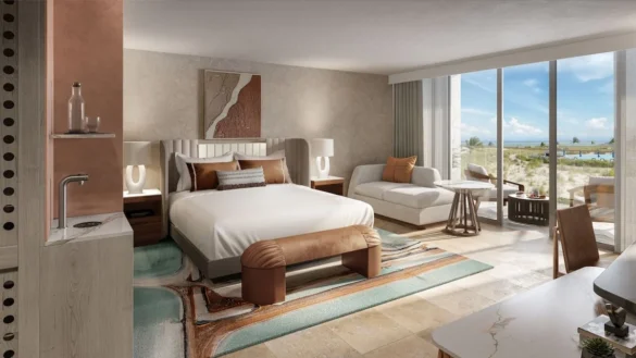 a bedroom with a bed and a couch