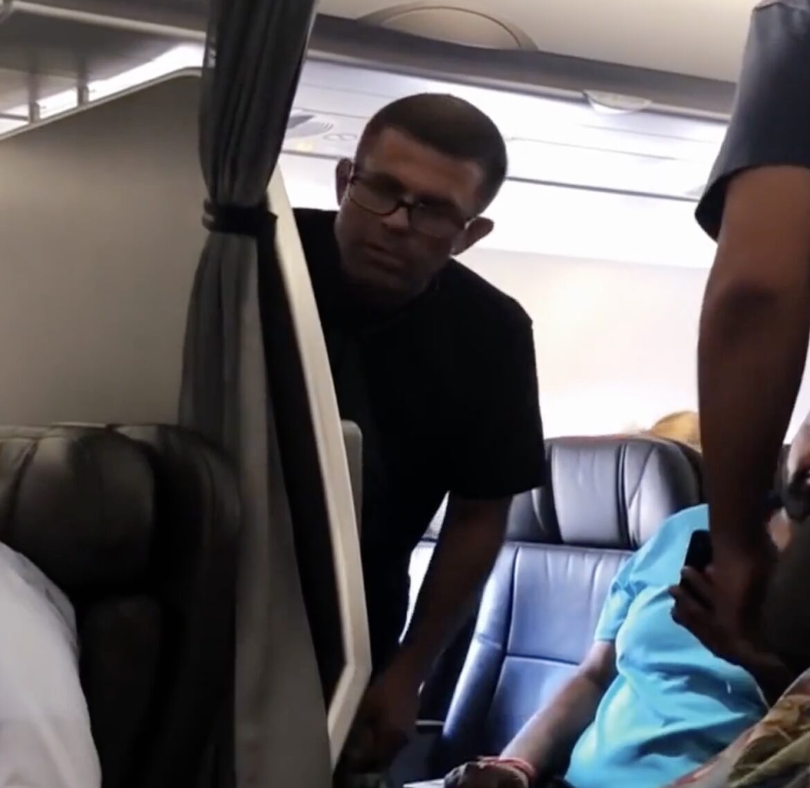 Passenger AA Steals Seat