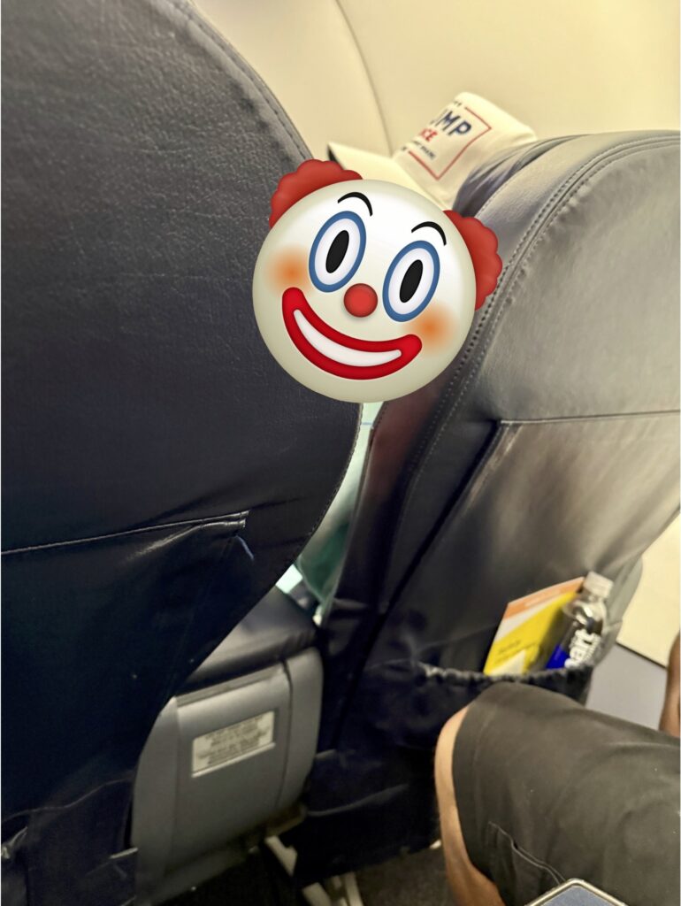 a cartoon face on a seat