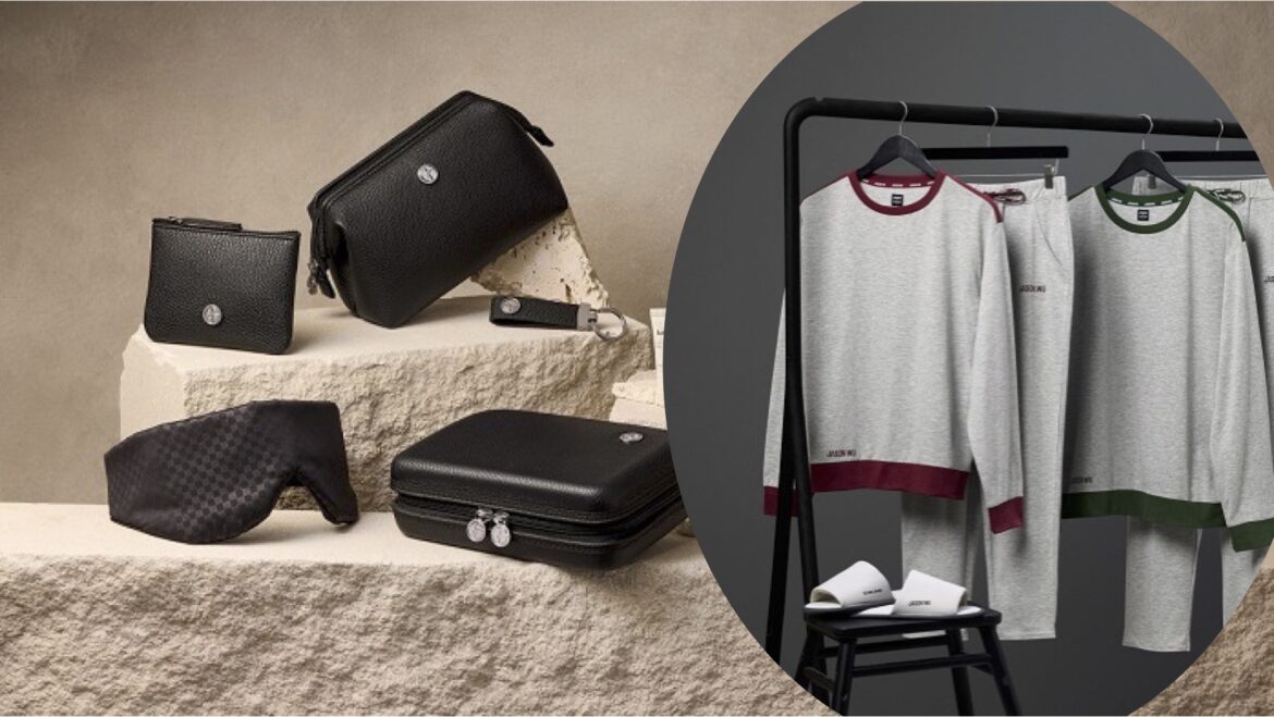 a black and white photo of a clothing rack