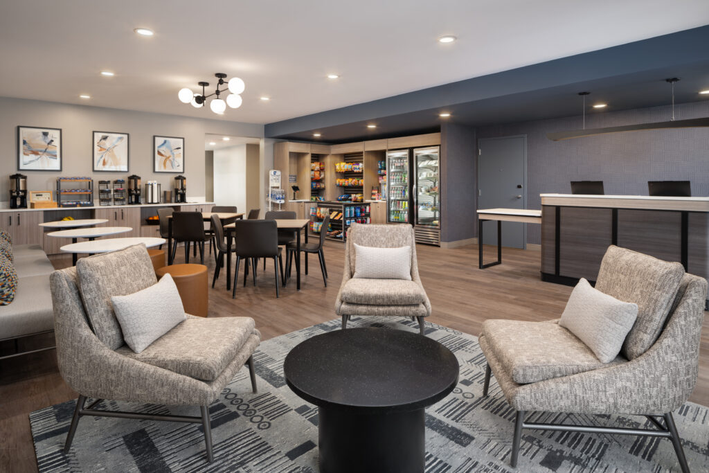 a room with a coffee shop and a bar