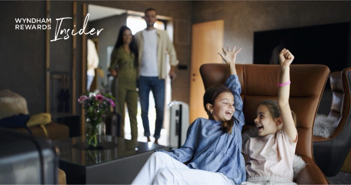 a group of children sitting on a chair