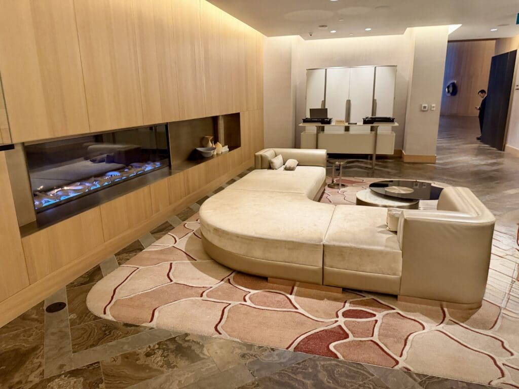 a living room with a fireplace and a couch