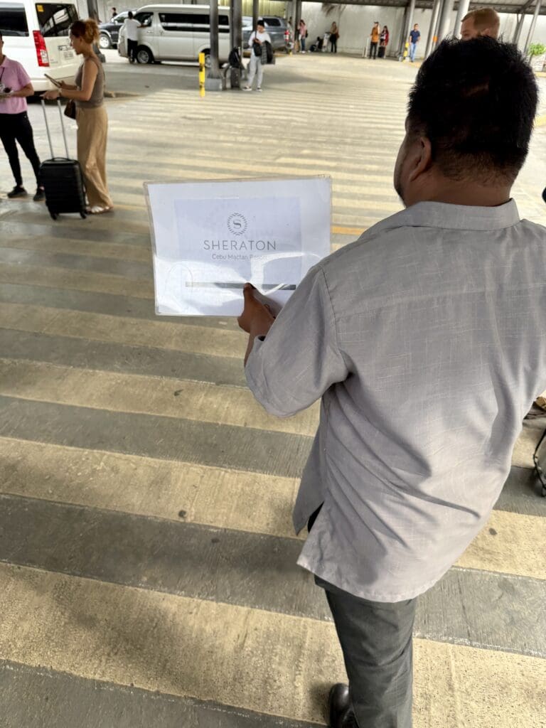 a man holding a piece of paper